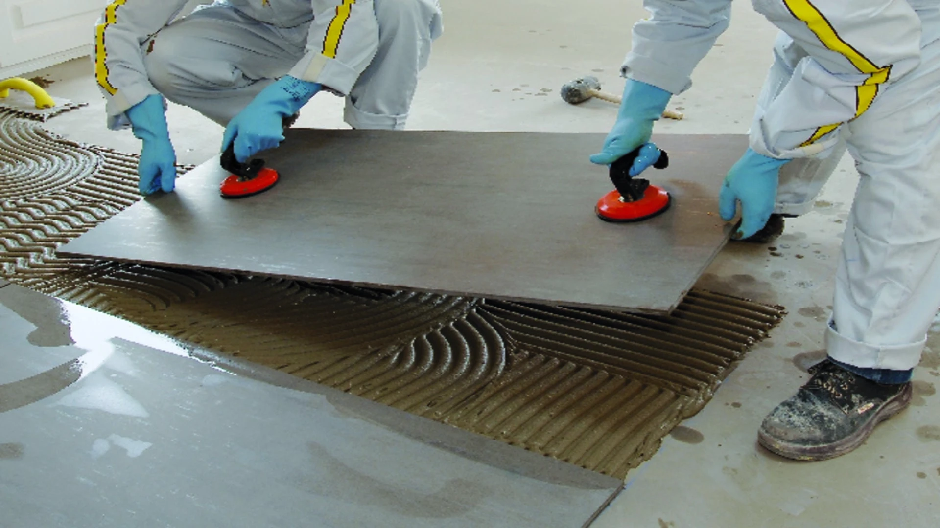 using high performance tile adhesive